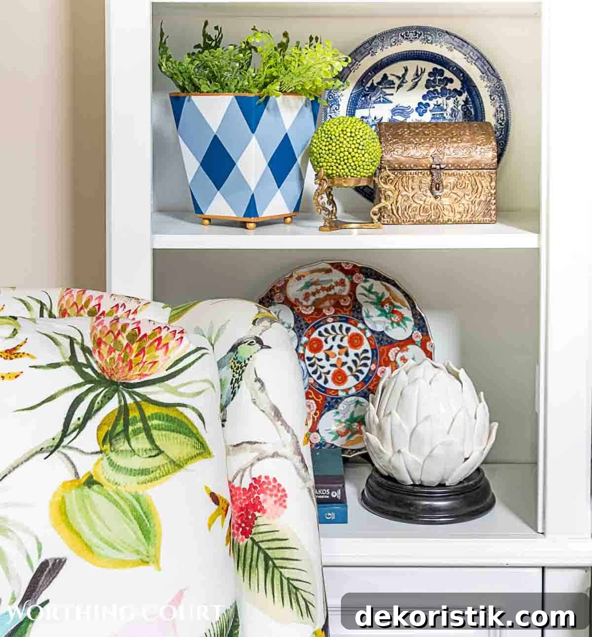 white shelves with summer accessories behind a colorful chair