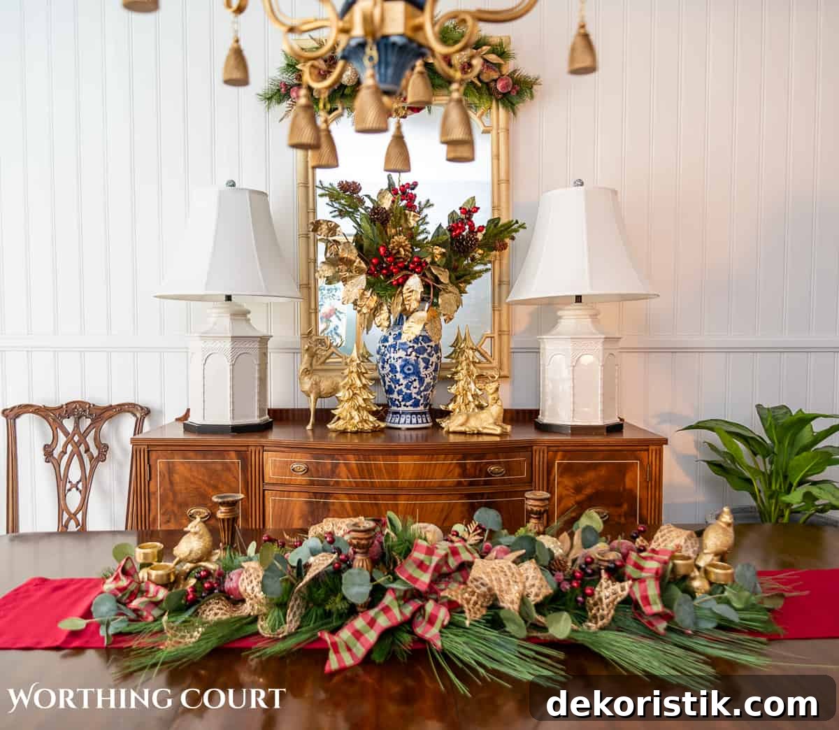 Elegant Christmas Dining Table Centerpiece Ideas 13 An elegant, but easy Christmas centerpiece made with faux greenery and sugared fruit swags. Includes green, burgundy and gold ribbon, gold candlesticks and white candles.