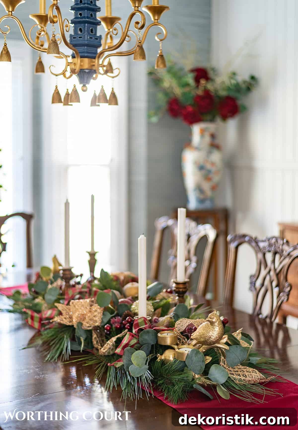 Elegant Christmas Dining Table Centerpiece Ideas 14 An elegant, but easy Christmas centerpiece made with faux greenery and sugared fruit swags. Includes green, burgundy and gold ribbon, gold candlesticks and white candles.