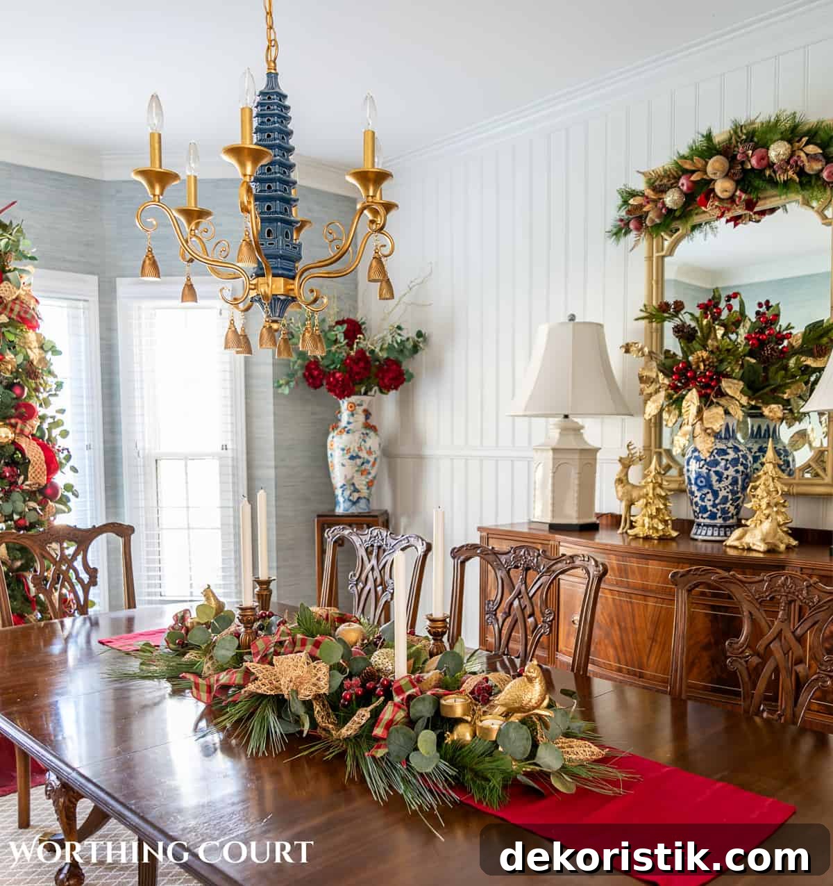 Elegant Christmas Dining Table Centerpiece Ideas 6 An elegant, but easy Christmas centerpiece made with faux greenery and sugared fruit swags. Includes green, burgundy and gold ribbon, gold candlesticks and white candles.