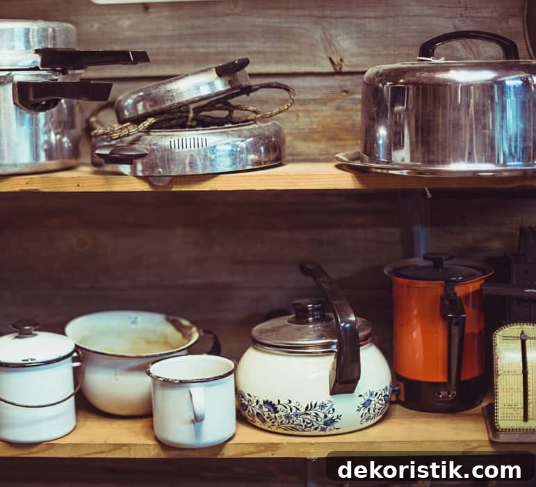wood shelves filled with various pots and pans