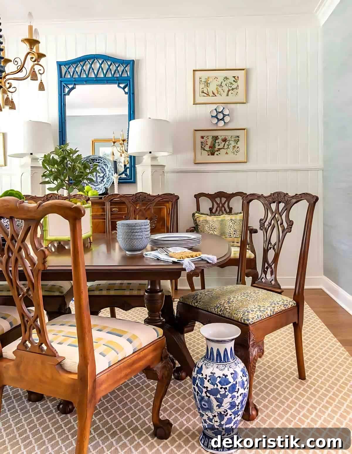 dining room with traditional brown furniture and chinoiserie accessories
