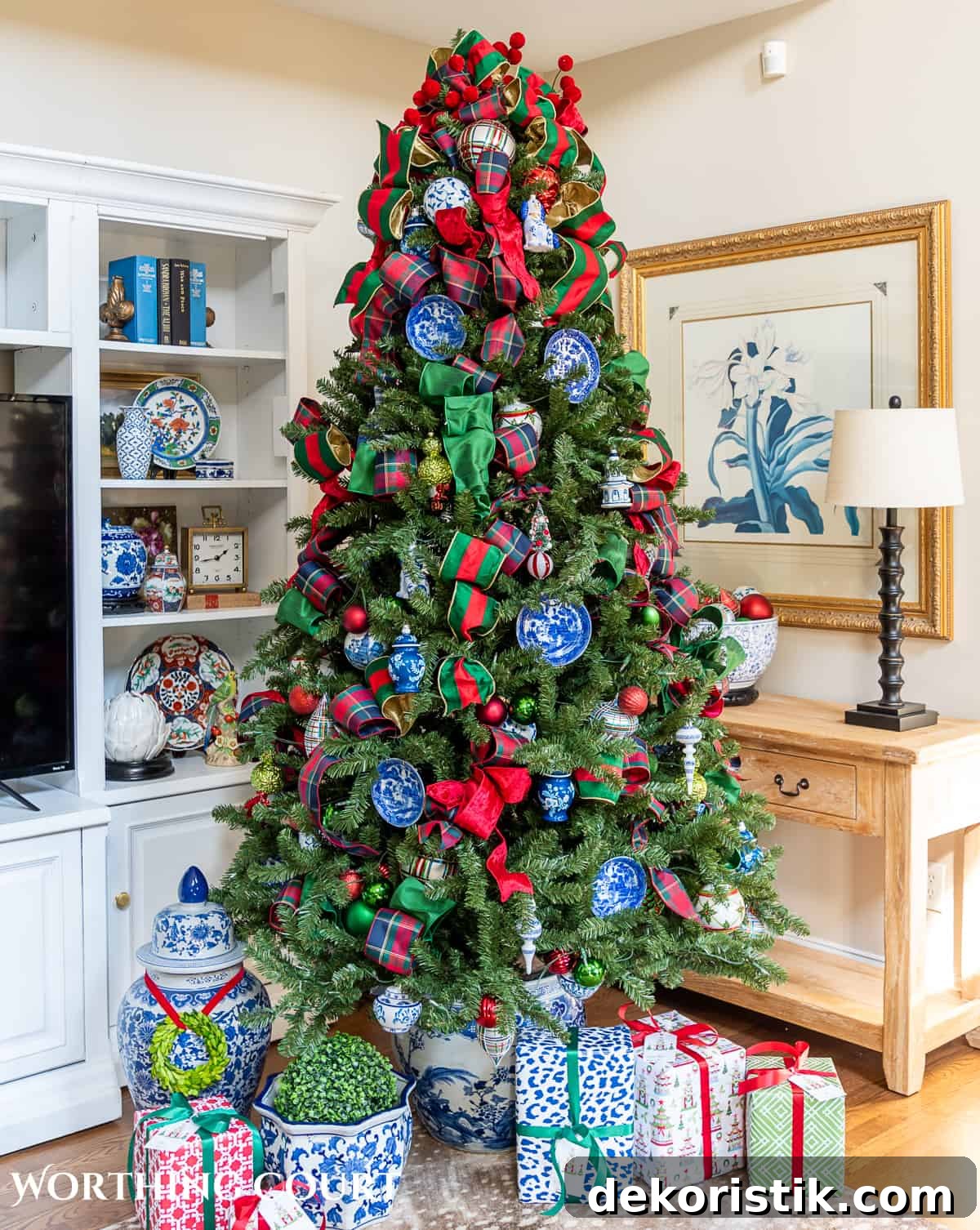 Christmas tree with traditional decorations in red, green, blue and white in a chinoiserie planters