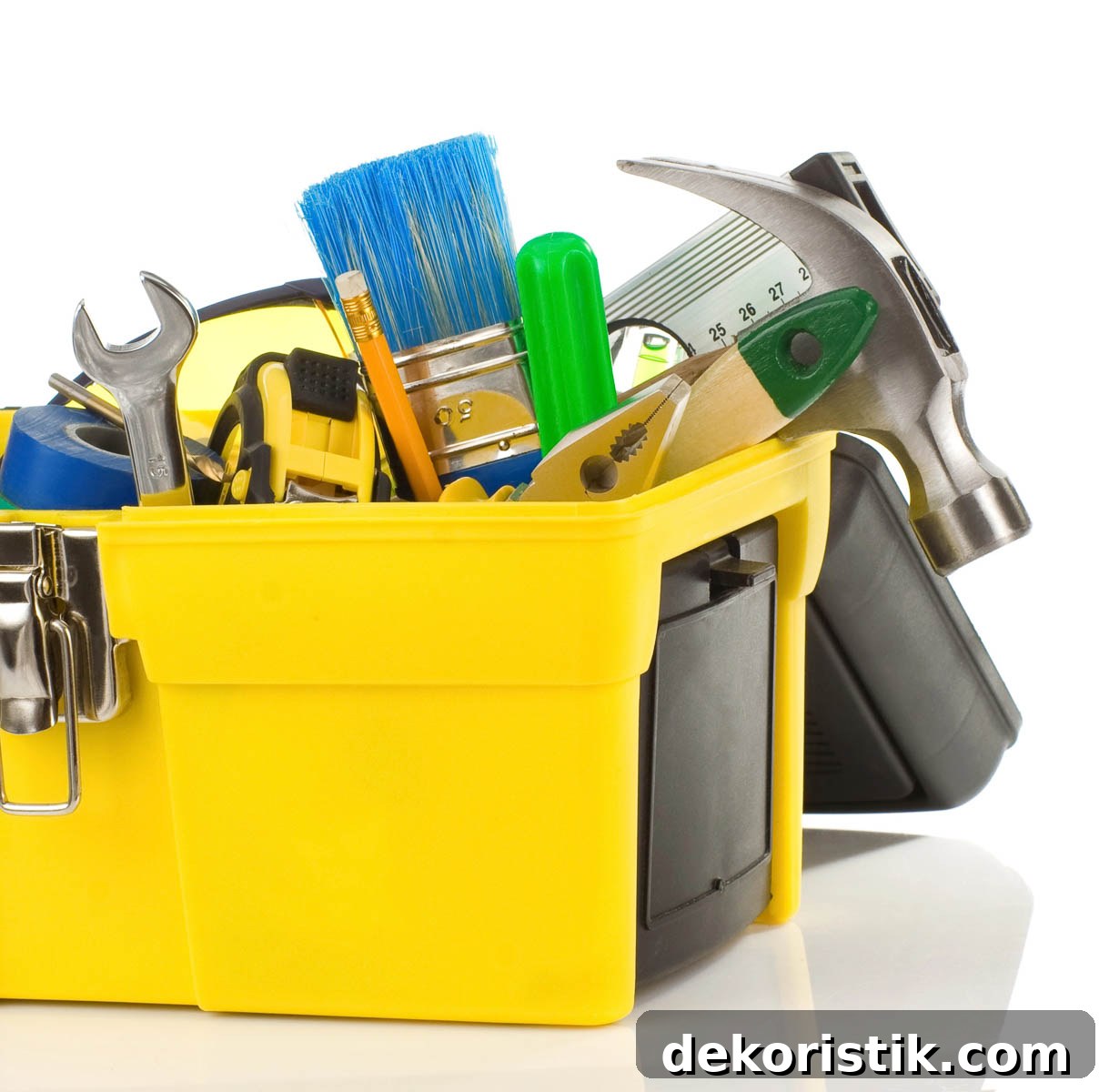 miscellaneous tools in a yellow toolbox