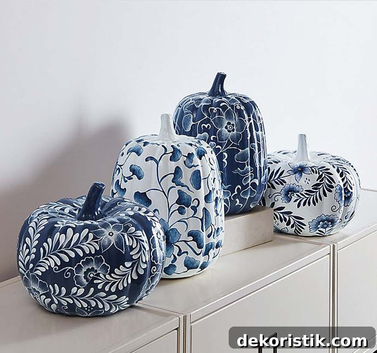 set of 4 blue and white pumpkins