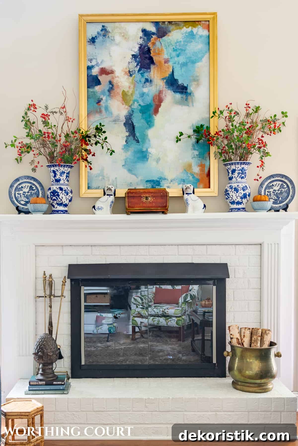 lanterns and pumpkins on a hearth