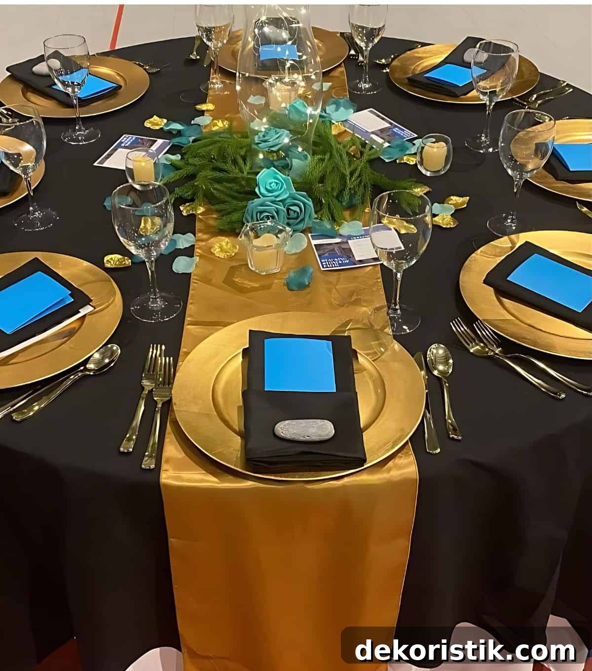 elegant banquet tablescape with black, bronze and teal