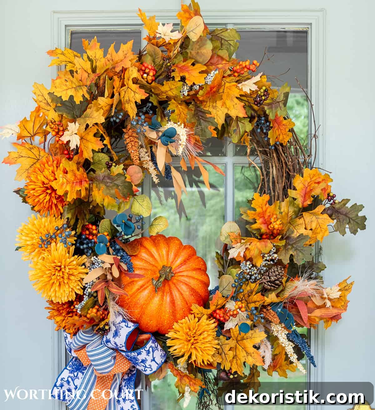 fall front door wreath on a gray door