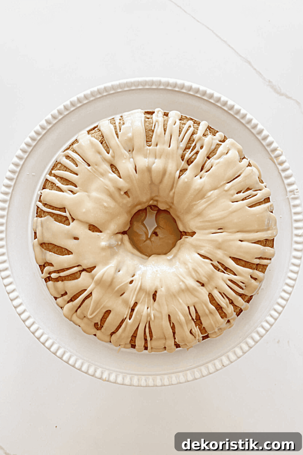 overhead view of a glazed bundt cake