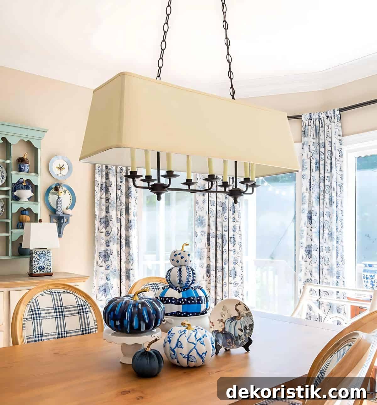 DIY Painted Pumpkin Centerpiece Ideas for Fall Decor 11 blue and white DIY painted pumpkins used as a centerpiece