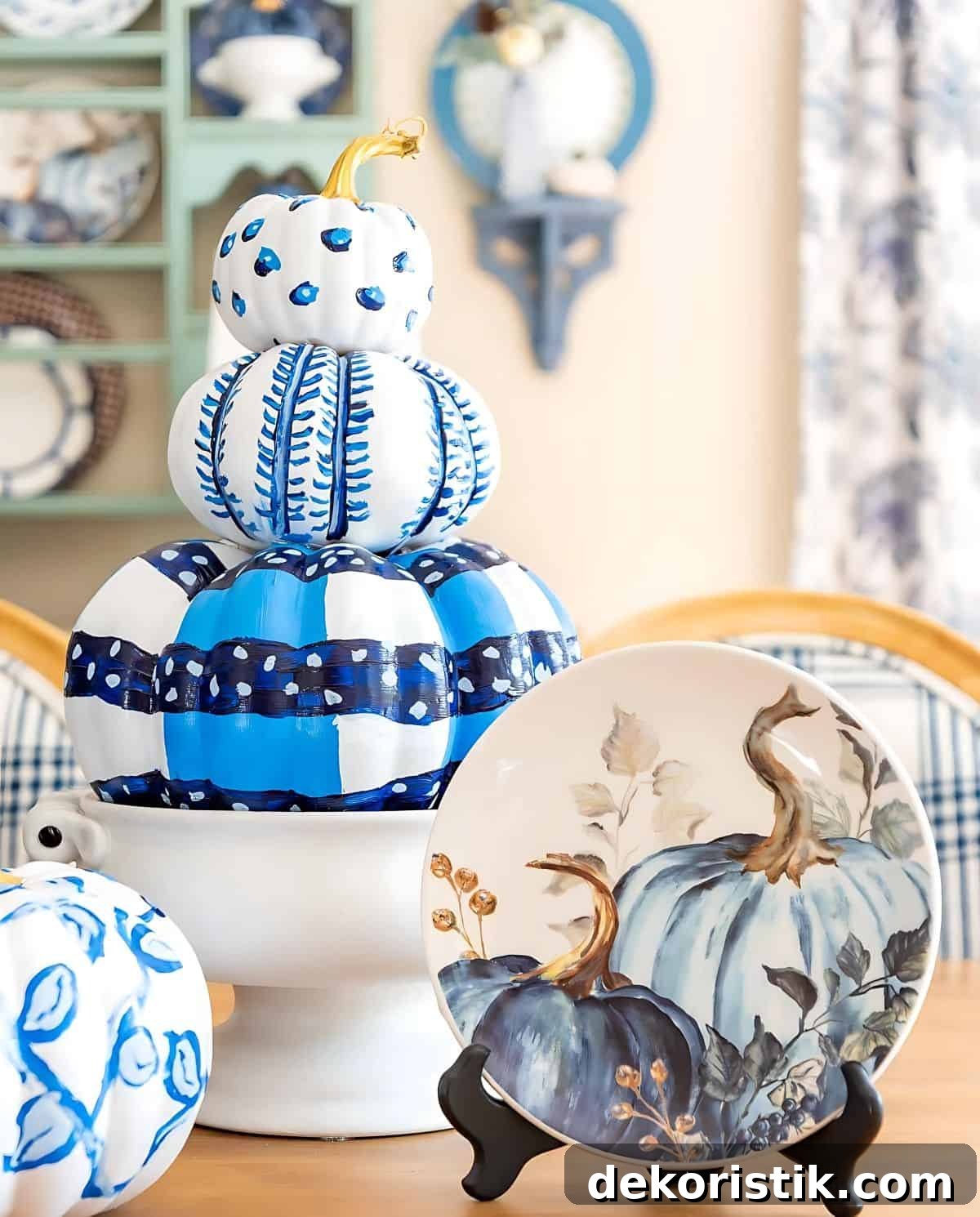 DIY Painted Pumpkin Centerpiece Ideas for Fall Decor 6 blue and white DIY painted pumpkins used as a centerpiece