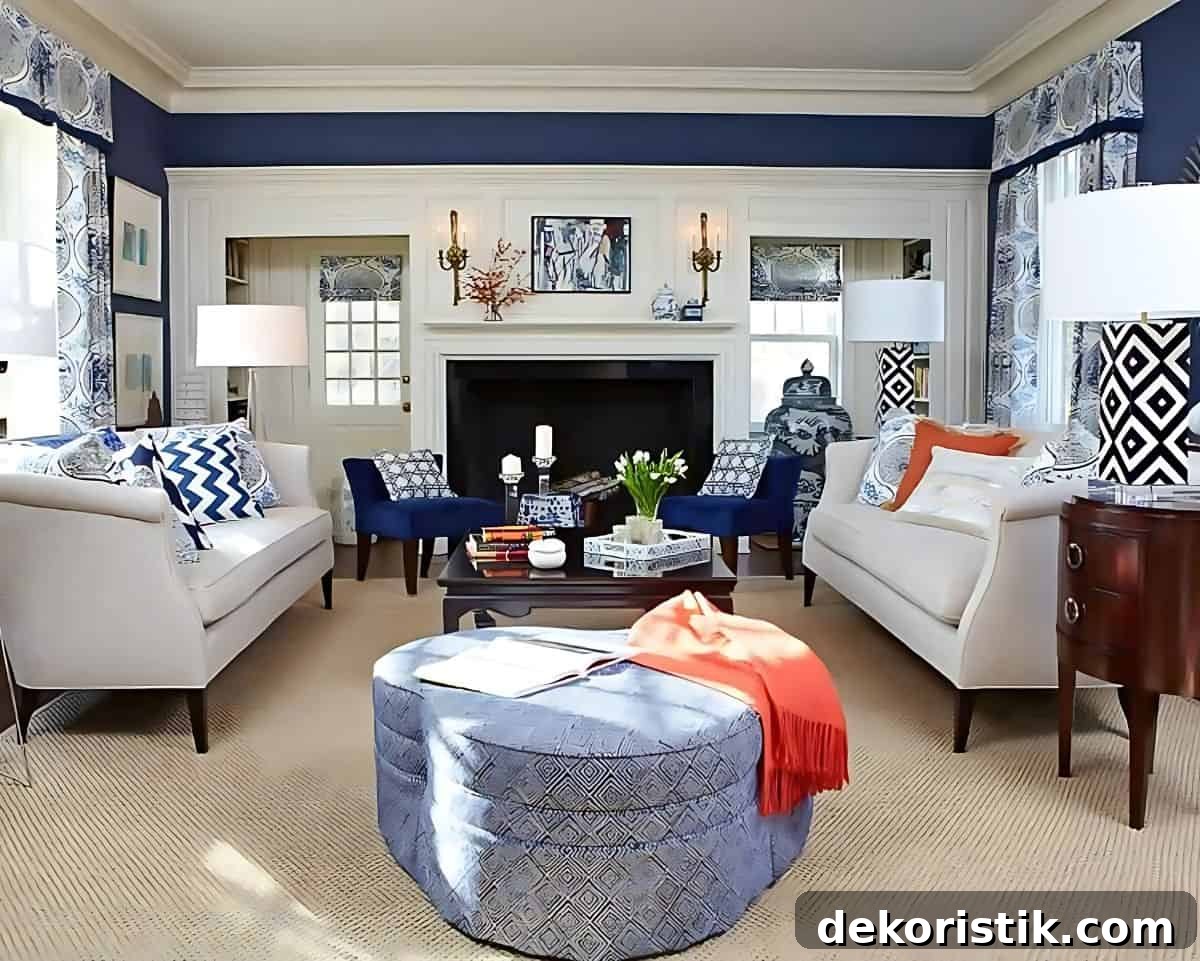 living room with blue walls, blue accessories and a pair of neutral sofas facing one another