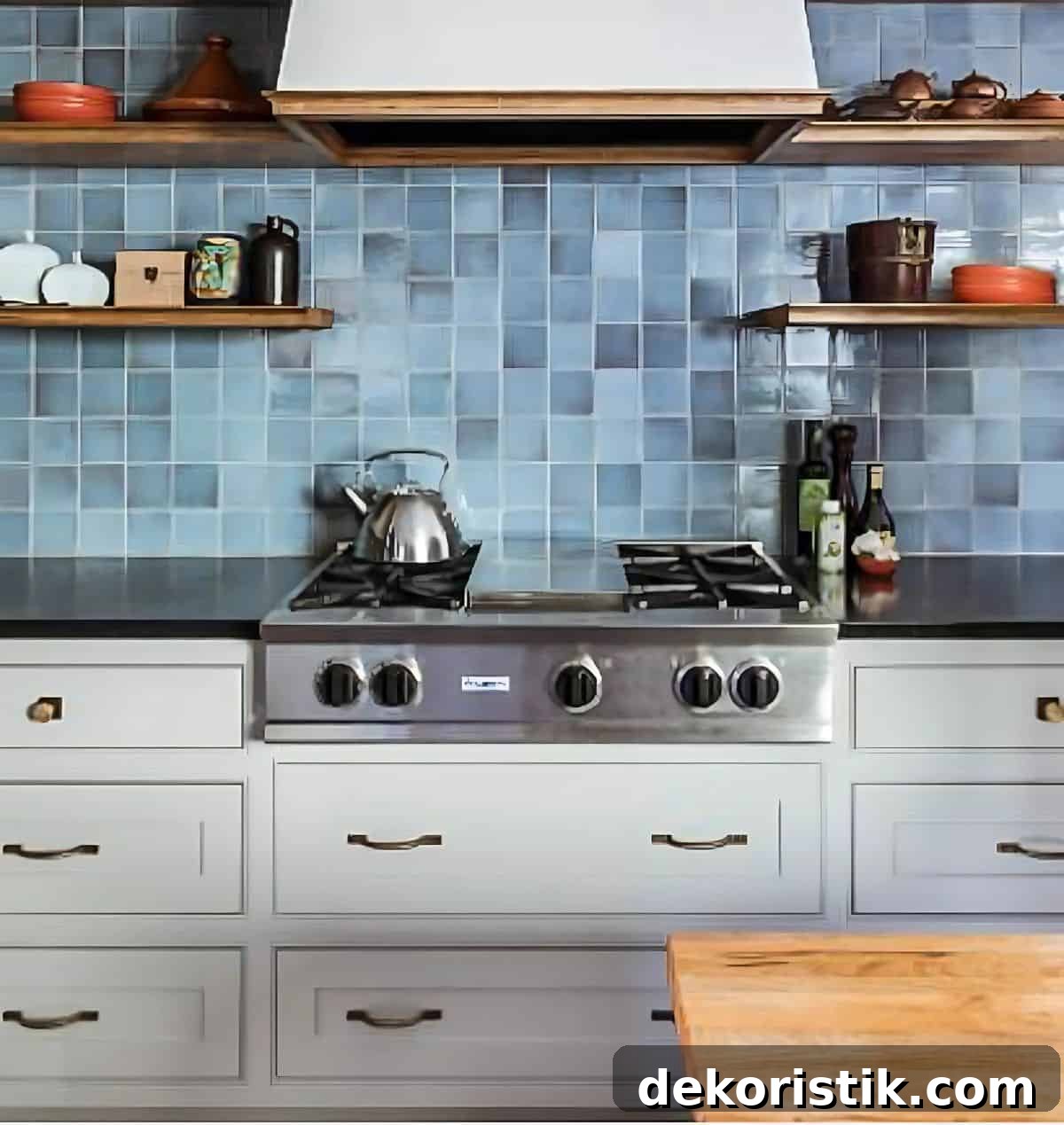 mottled blue ceramic tile backsplash in a kitchen