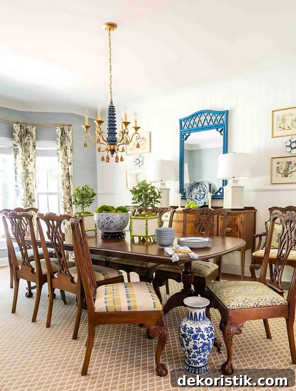 dining room with traditional brown furniture and chinoiserie accessories