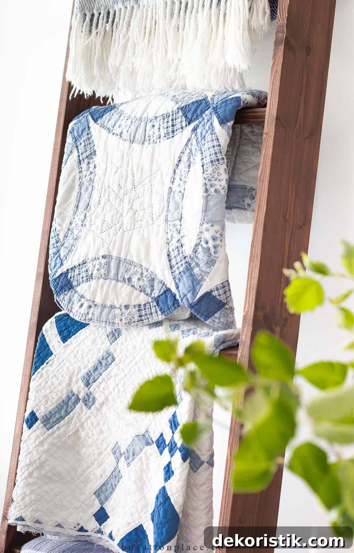 folded quilt on a blanket ladder