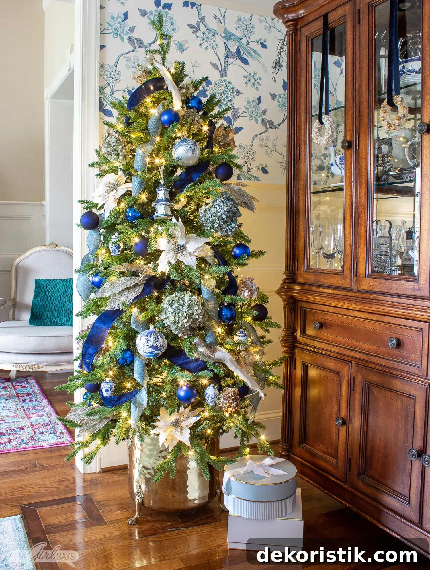 chinoiserie style Christmas tree decorated in a dining room