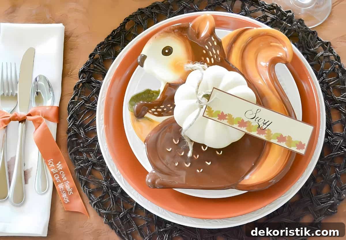 Thanksgiving place setting of stacked plates with a squirrel accent plate on top