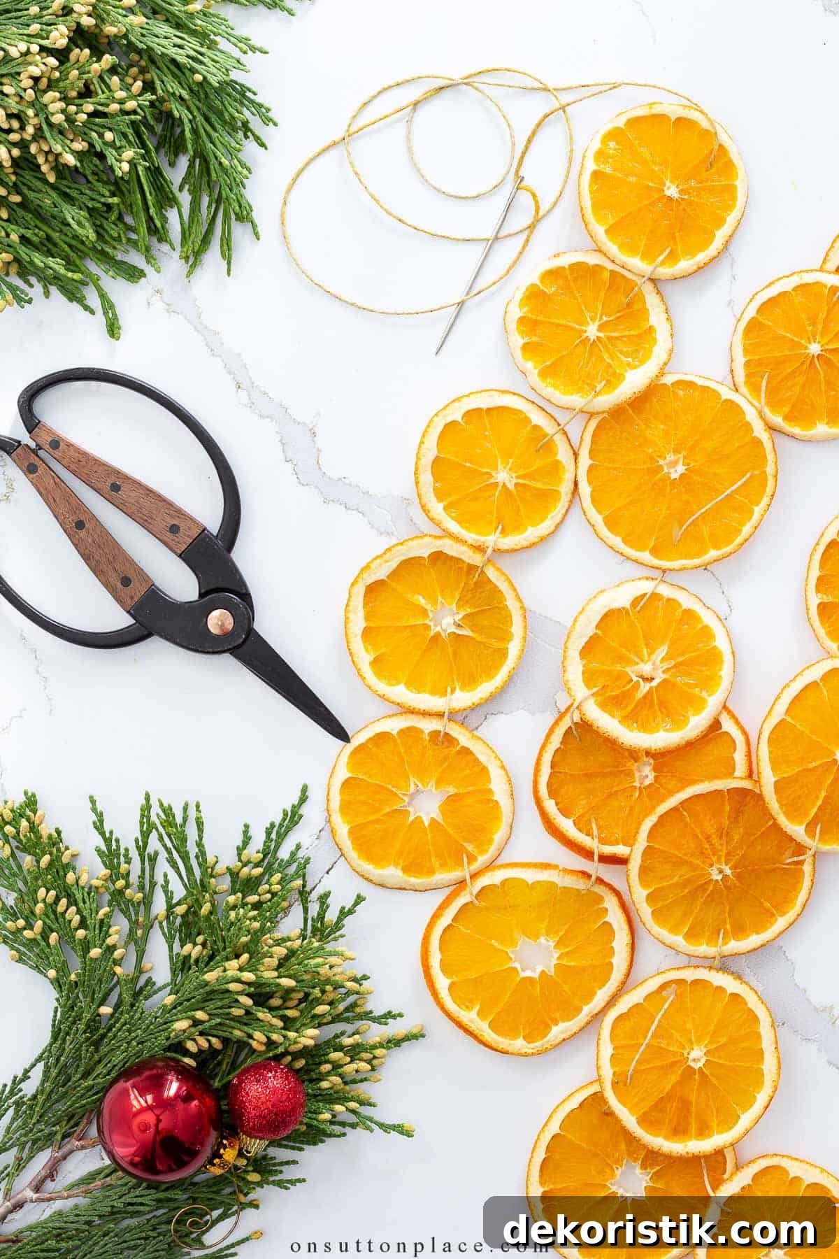 slices or oranges on a white counter