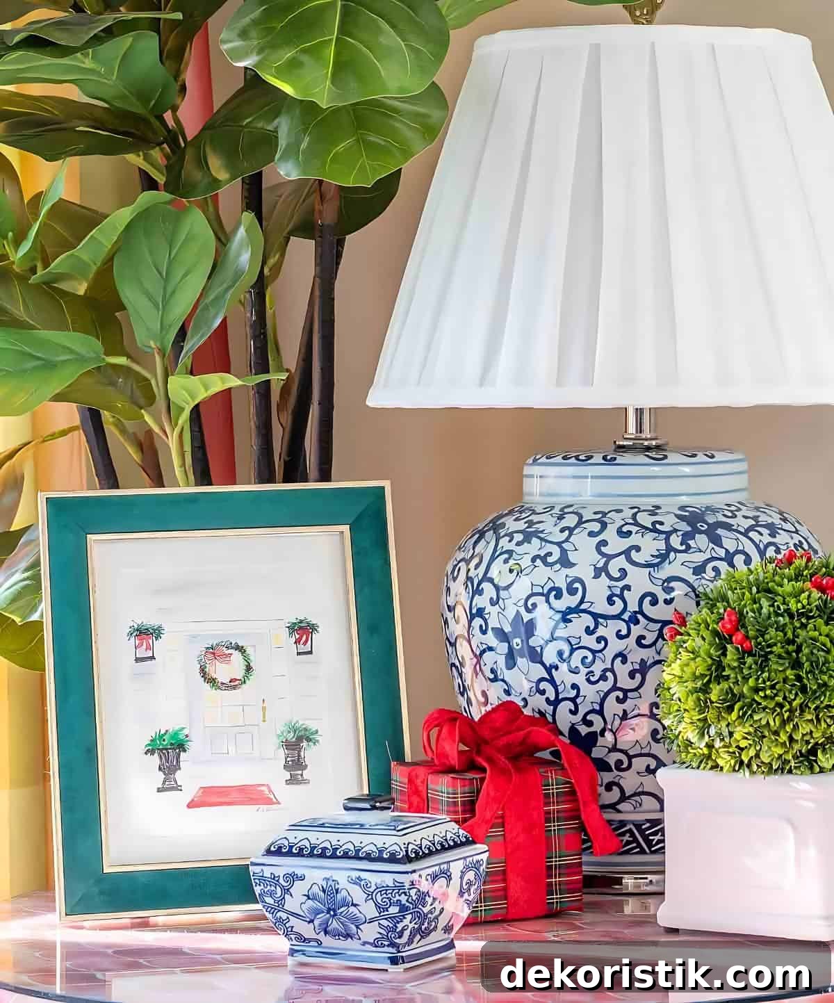 Christmas Vignette Ideas to Elevate Your Holiday Decor 4 blue and white lamp on a table with other Christmas accessories