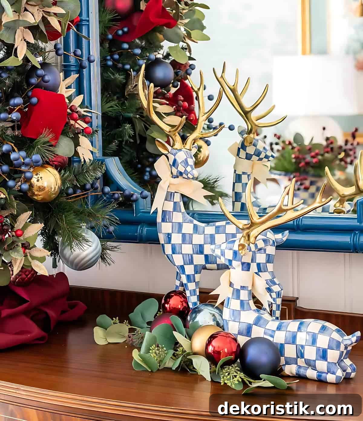 Christmas Vignette Ideas to Elevate Your Holiday Decor 6 blue and white deer with gold antlers and Christmas ornaments
