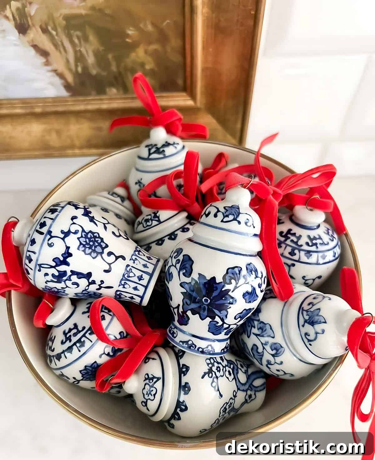 Christmas Vignette Ideas to Elevate Your Holiday Decor 9 overhead view of bowl filled with mini blue and white ginger jar Christmas ornaments