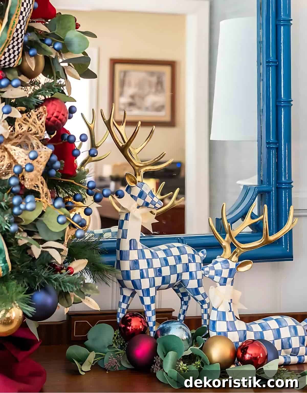 pair of blue and white checked deer beside Christmas tree