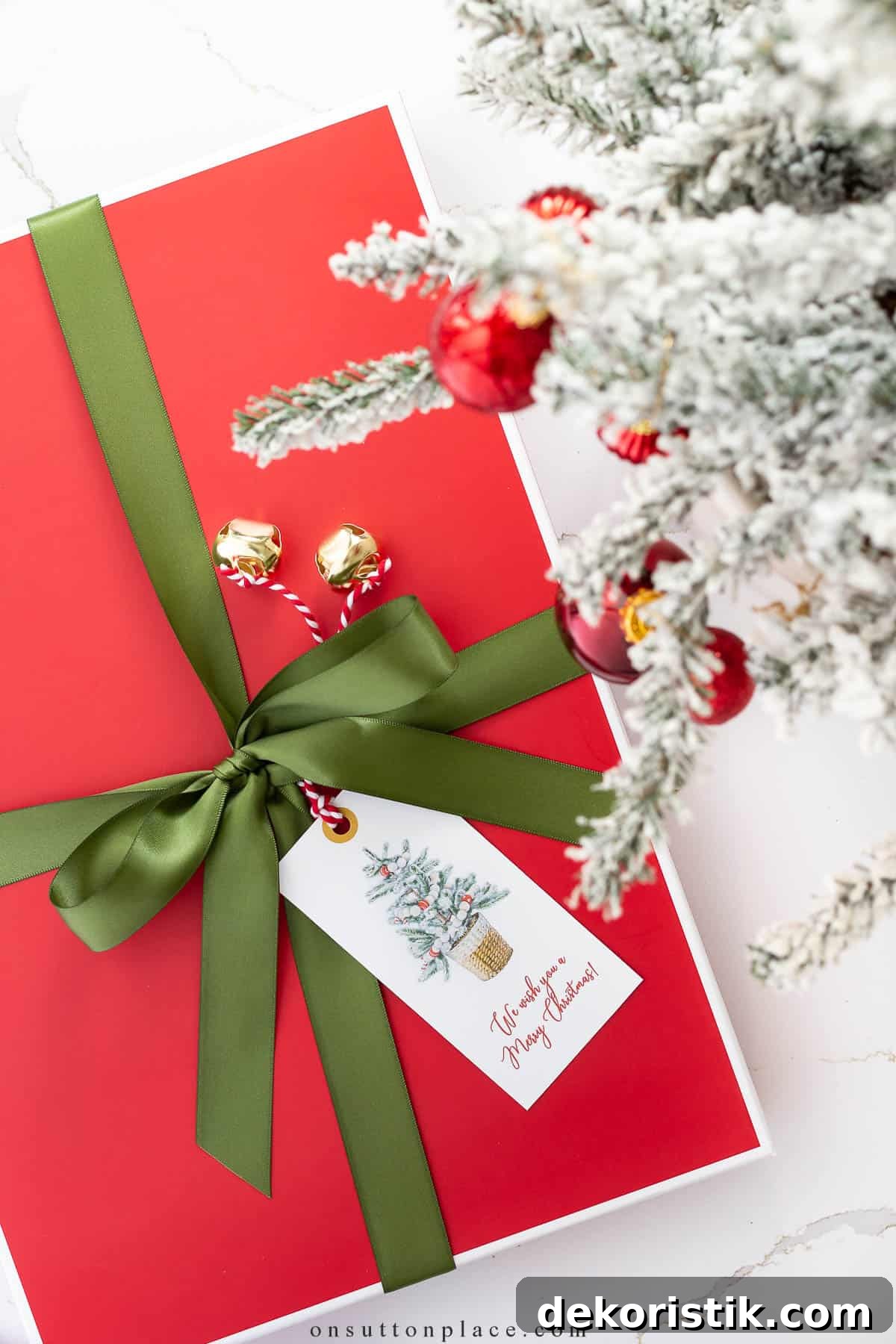gift wrapped with red paper and a green ribbon