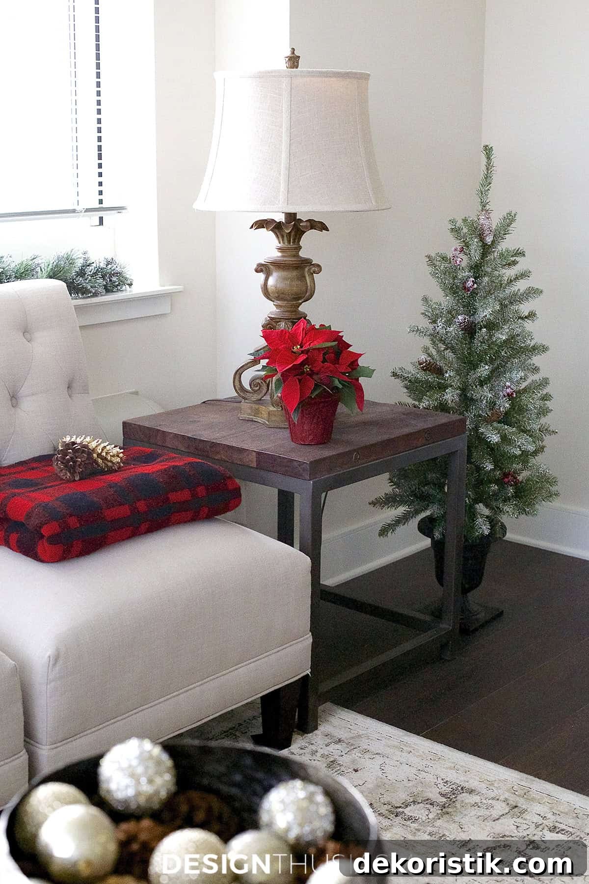 white chair and wood end table with burgundy accents