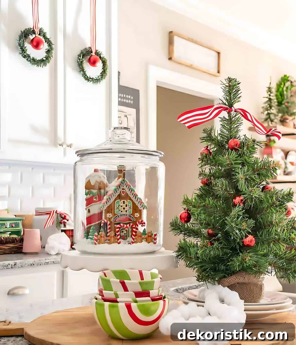 mini Christmas tree vignette on a kitchen island