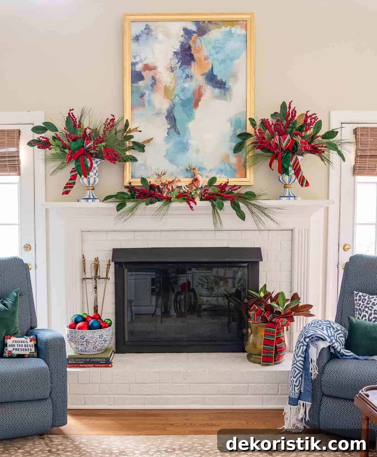 white brick fireplace and mantel decorated with traditional red and green for Christmas