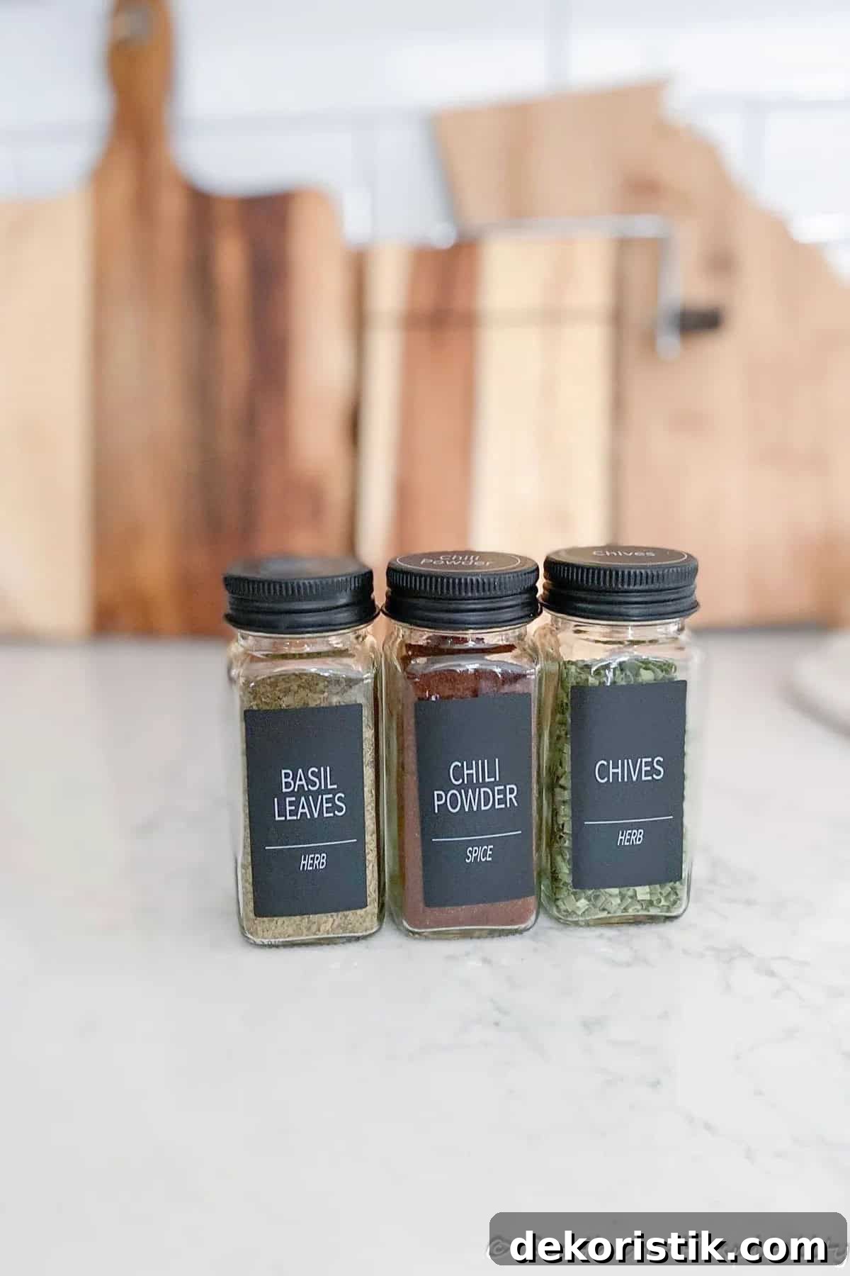 3 spice jars on a counter