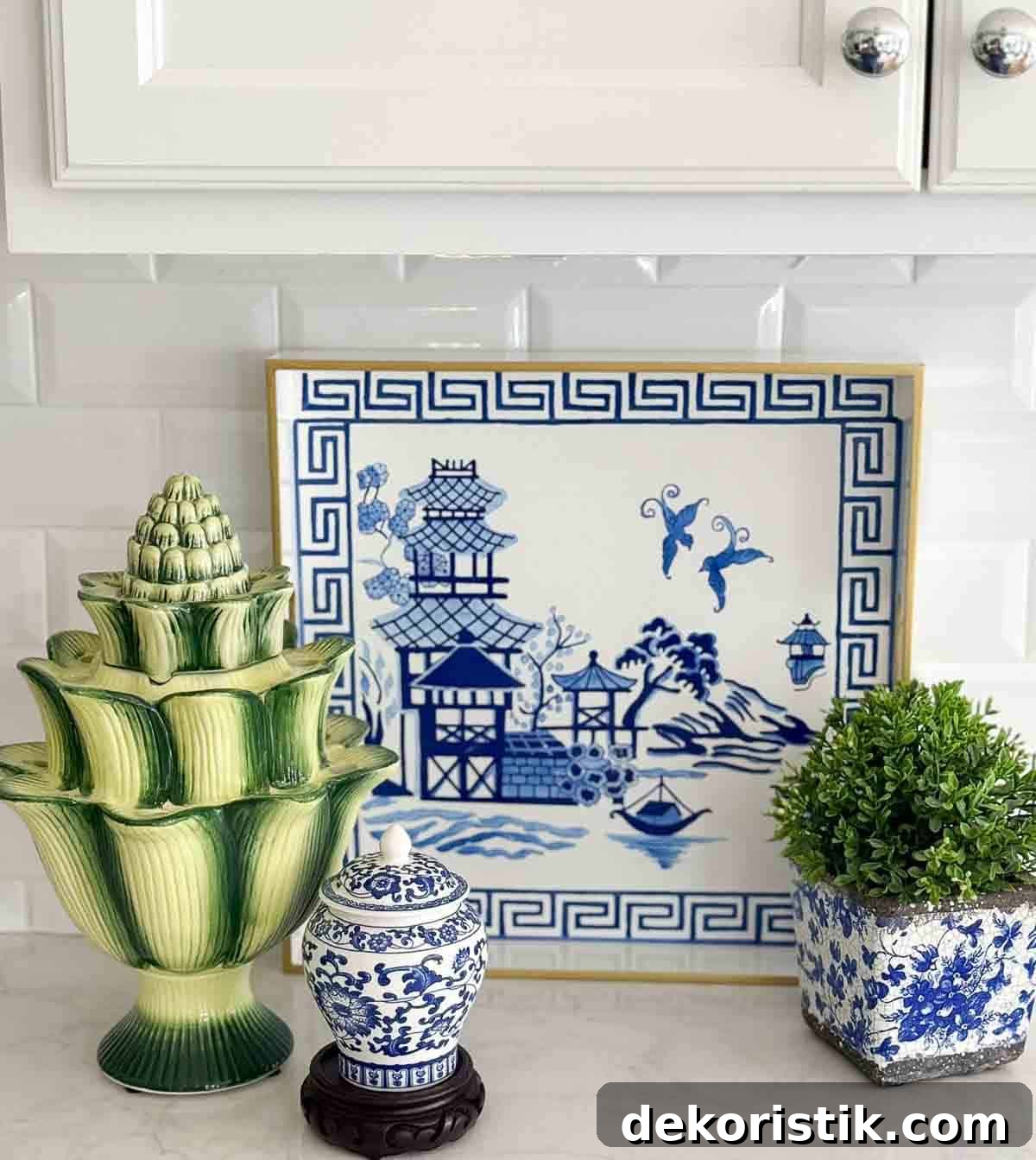 blue, white, and green accessories in an all white kitchen