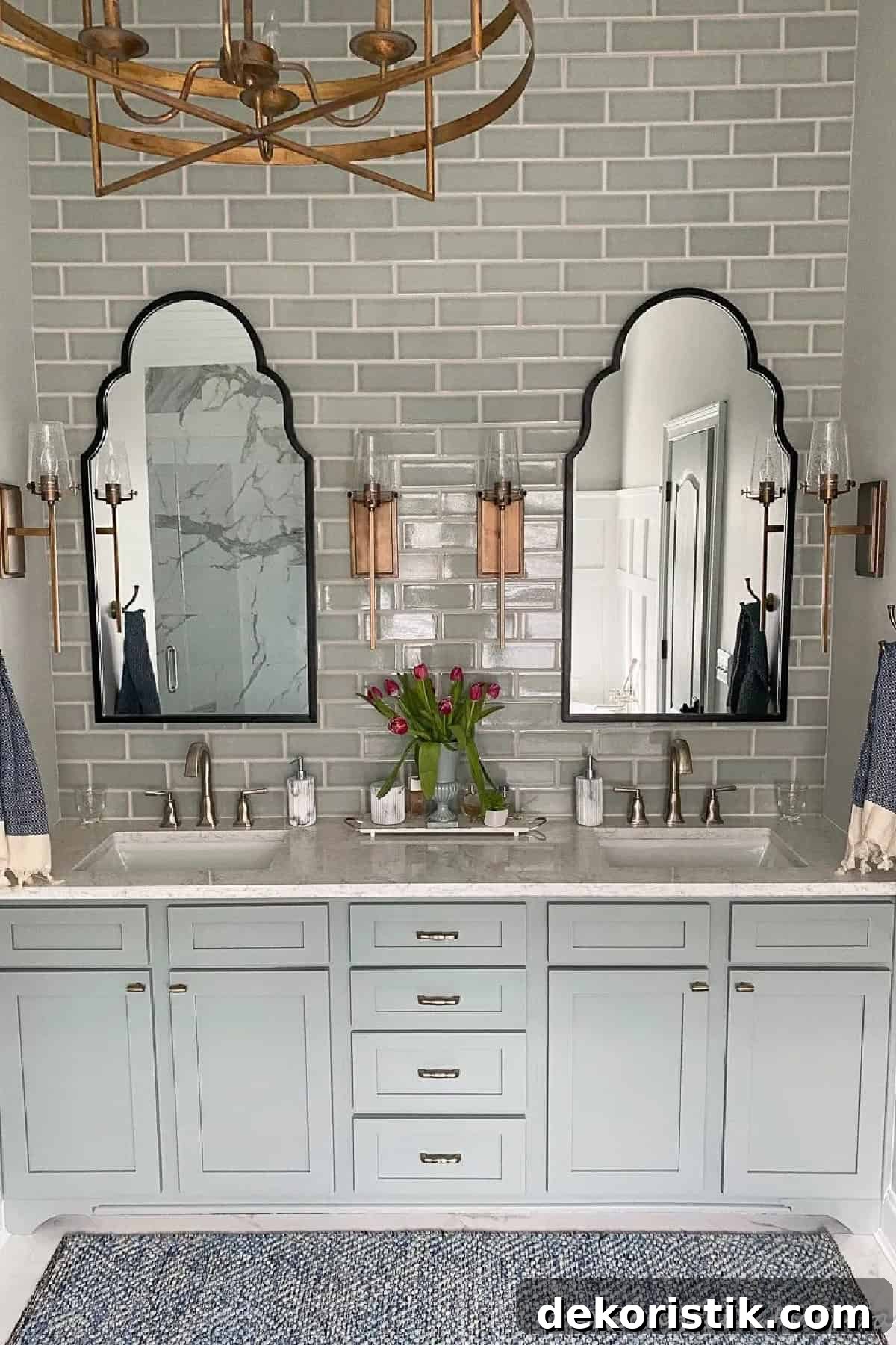 bathroom vanity with two arched mirrors above