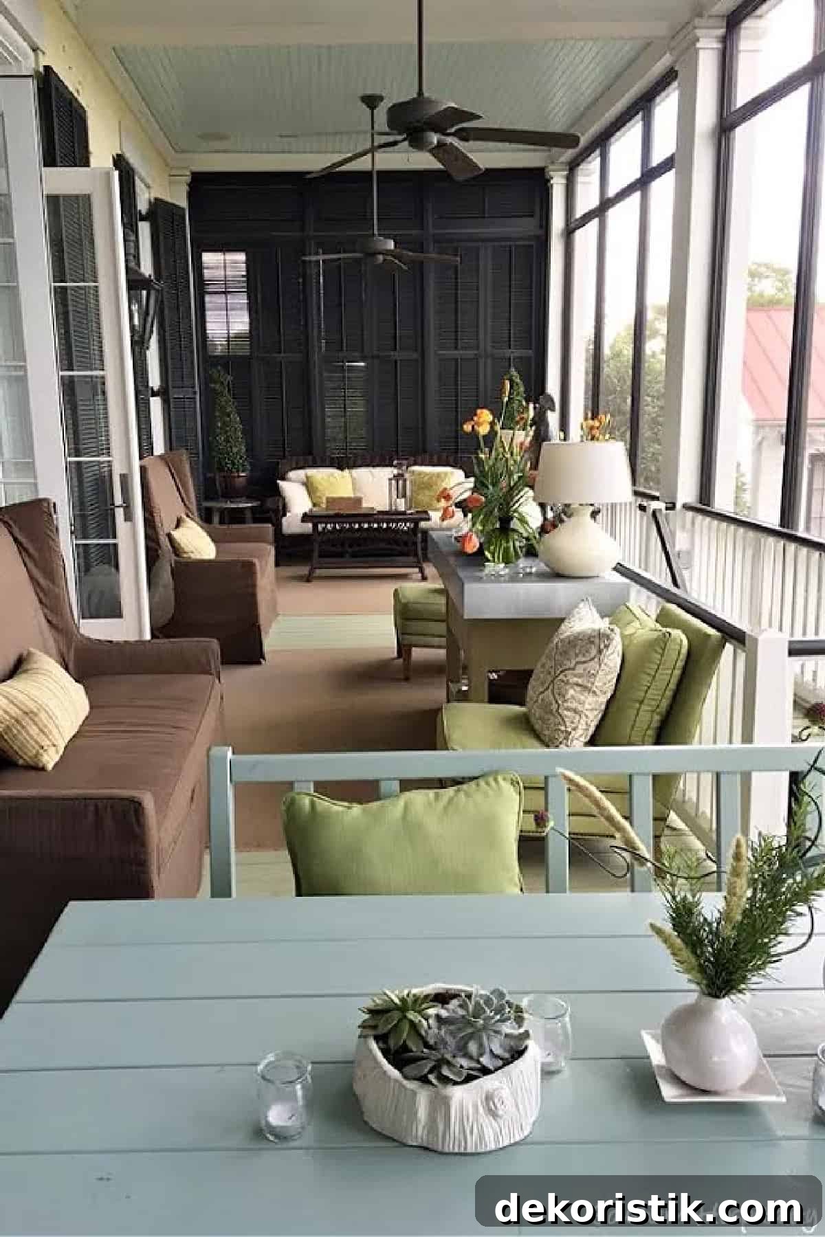 Breezy Summer Decor Ideas and Garden Favorites 5 screen porch with brown and green furnishings and a haint blue ceiling