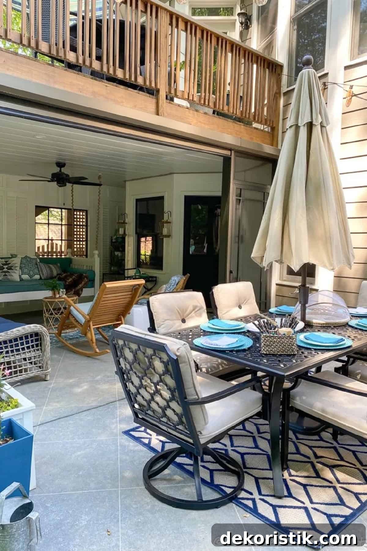 porch and patio under a wooden deck with blue and teal decor