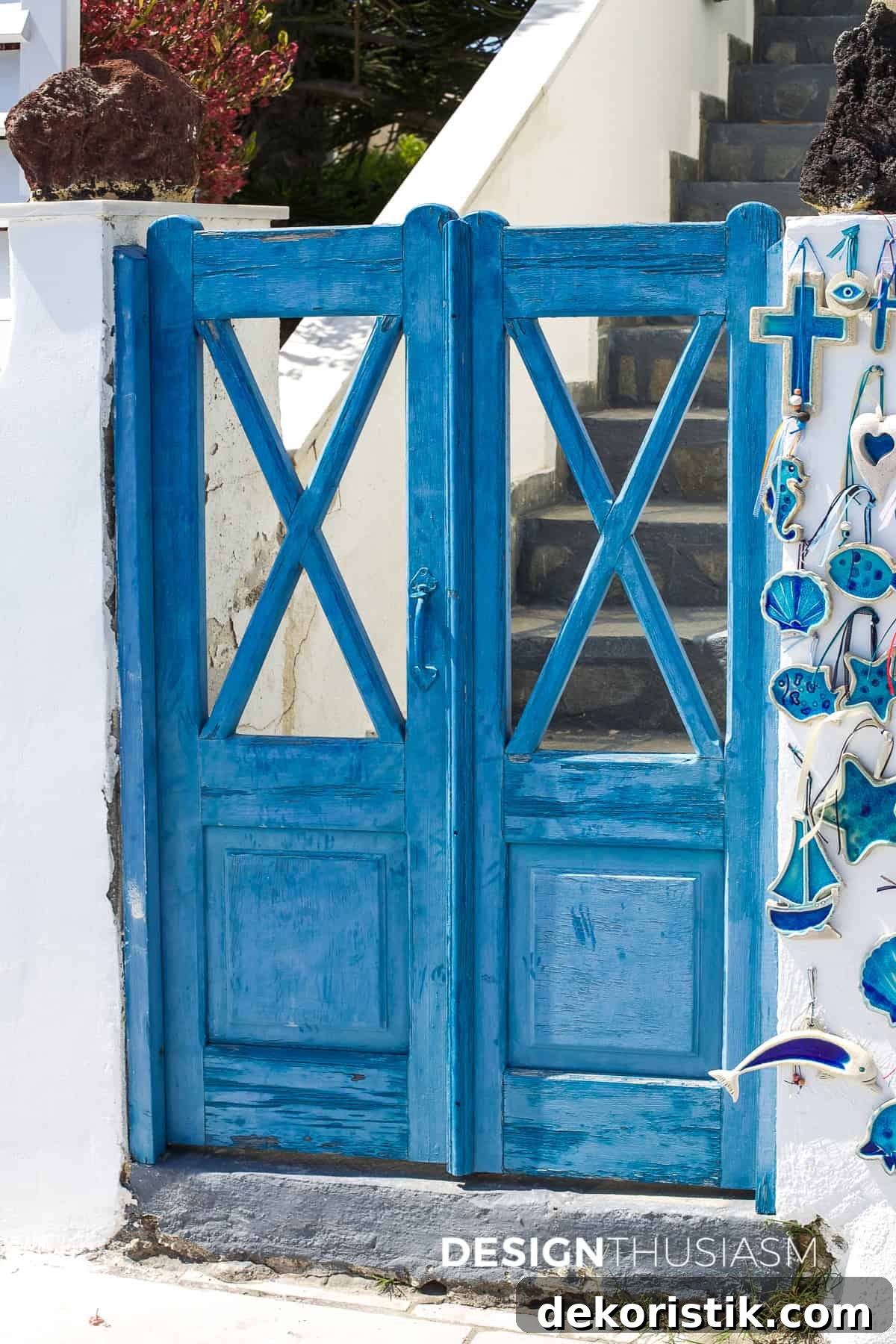 blue gate in a white wall