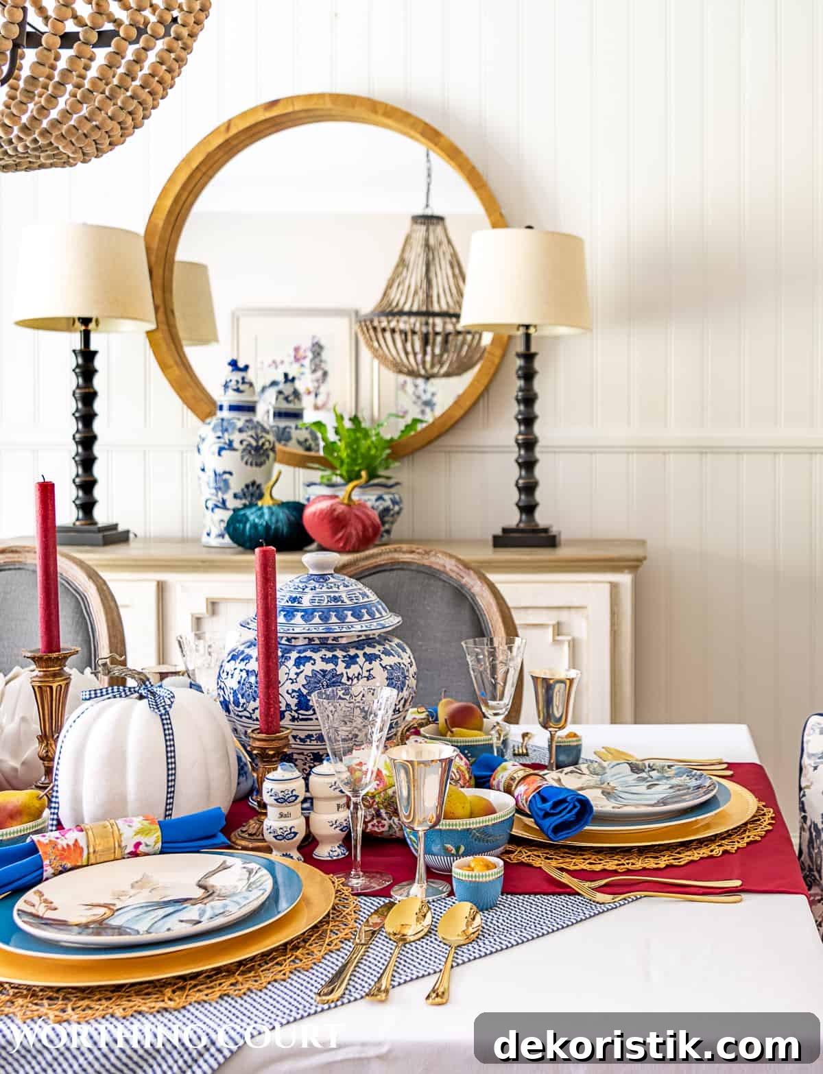 blue and white thanksgiving table setting with touches of burgundy