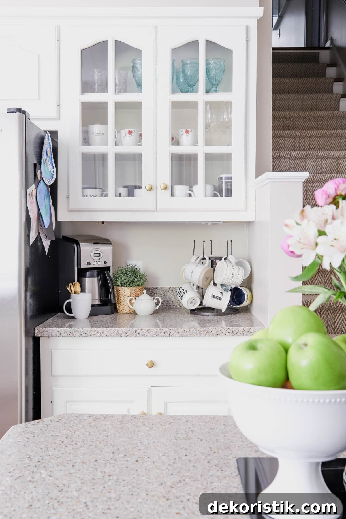 coffee bar setup in a kitchen with white cabinets