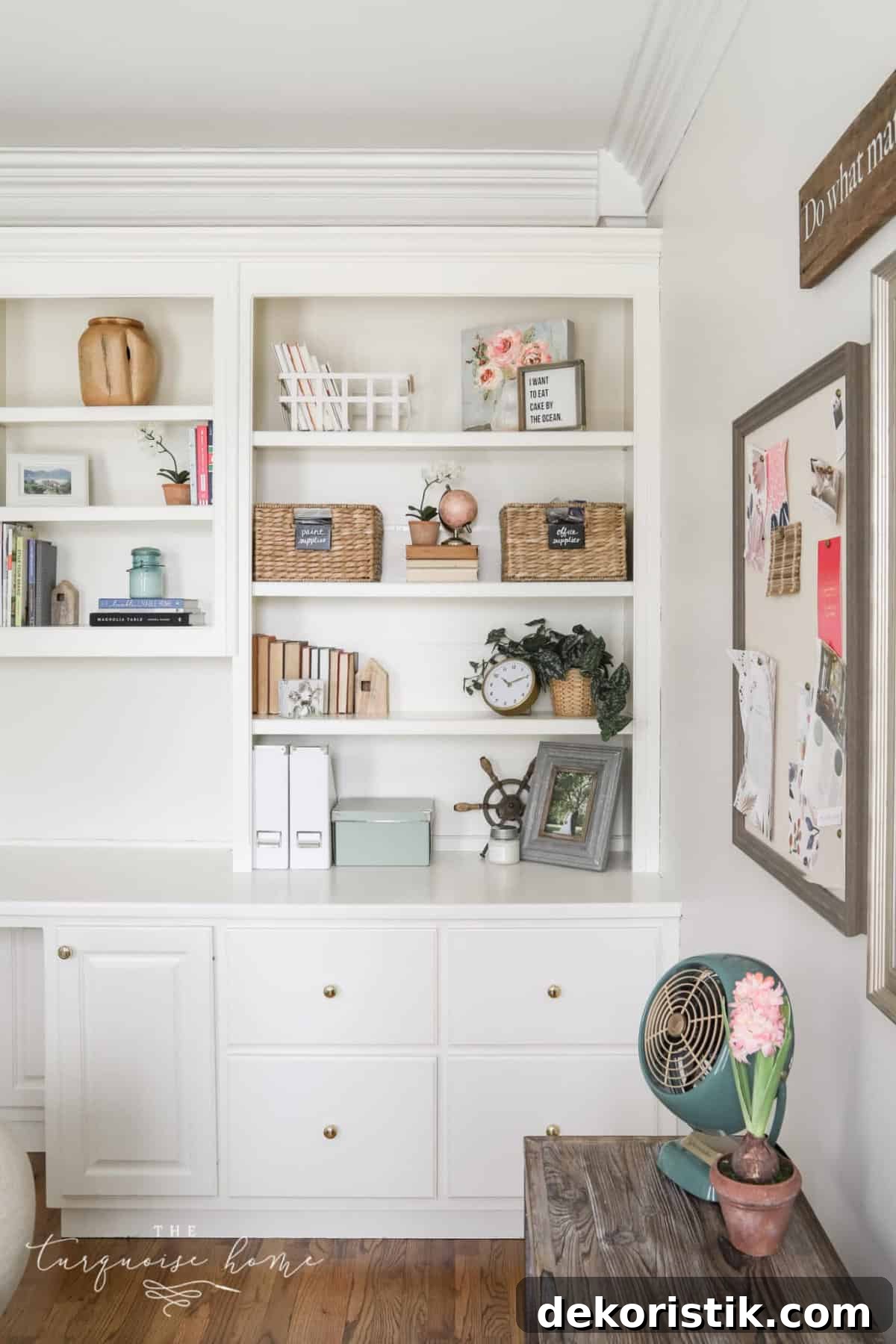 styled built-in white bookcases and cabinets