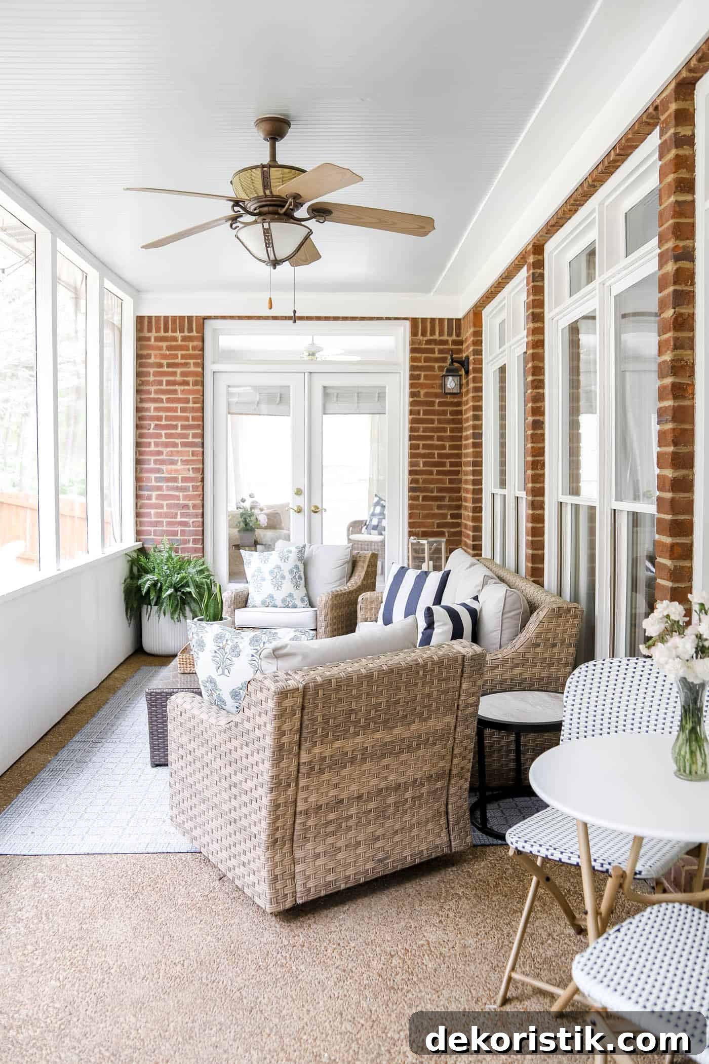 enclosed porch with a seating area