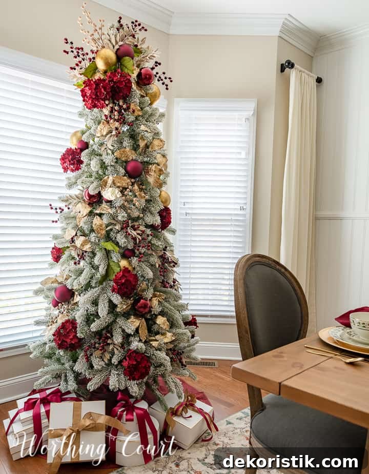 gold and burgundy decorations on a Christmas tree