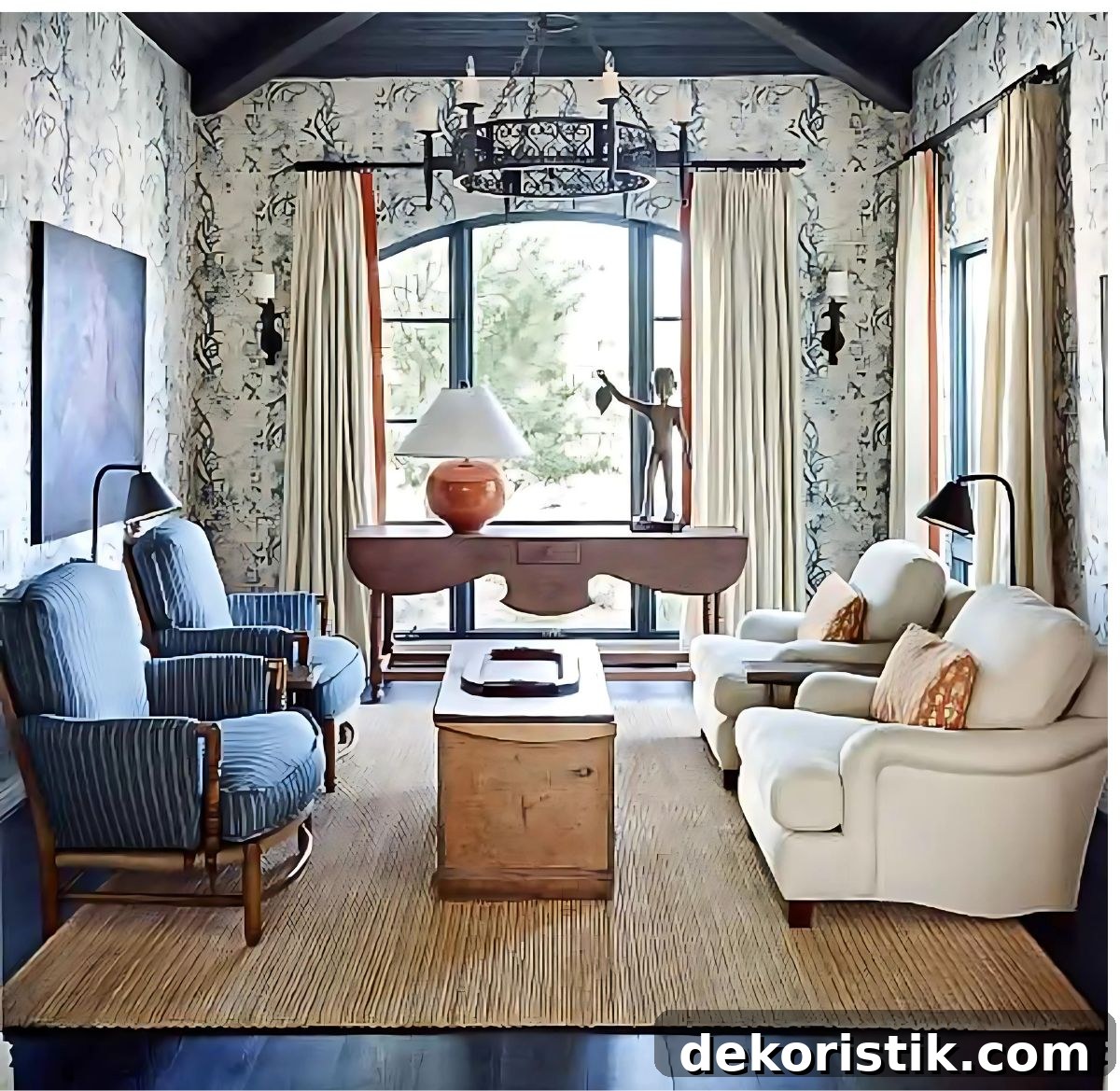 cozy living room with blue chairs and white chairs and blue and white wallpaper