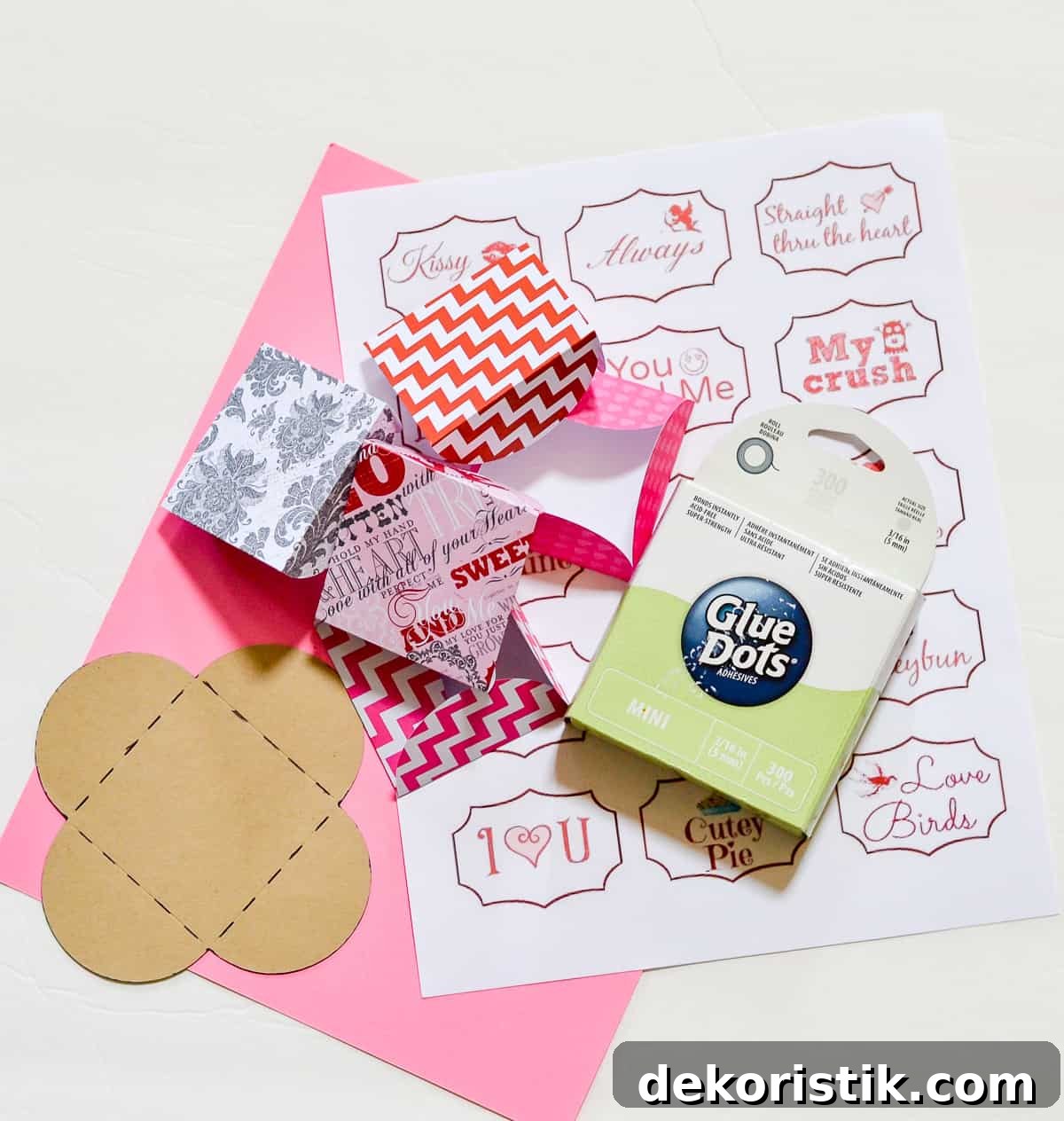 Supplies need to make mini Valentine's Day cards made with scrapbook paper