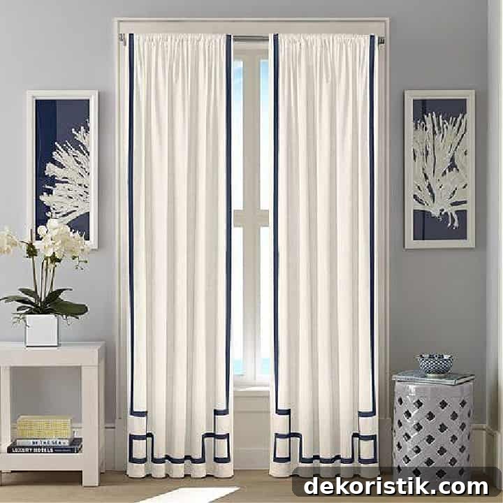 white curtains embellished with grosgrain ribbon in a fretwork pattern