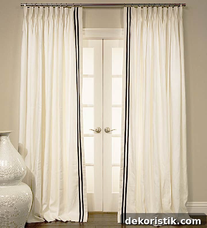 white curtains embellished with grosgrain ribbon