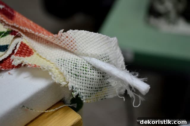 Folding fabric back and stapling
