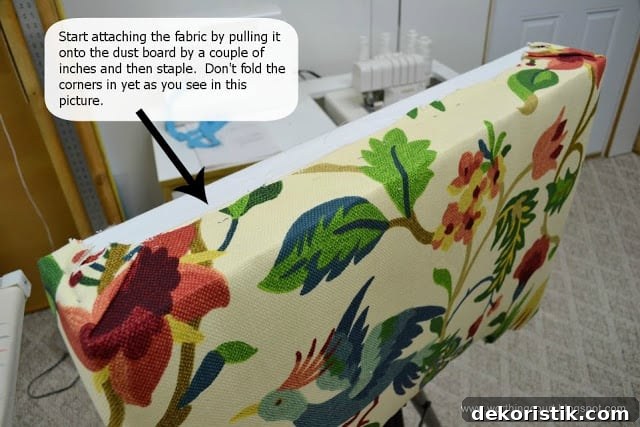 Stapling fabric to cornice
