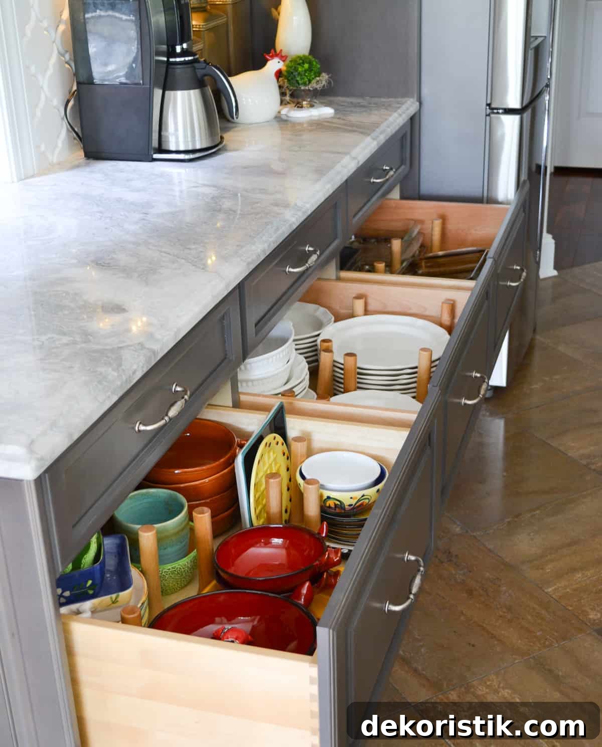 Stunning Kitchen Remodel: Before and After Reveal 8 organized kitchen drawers filled with plates and platters